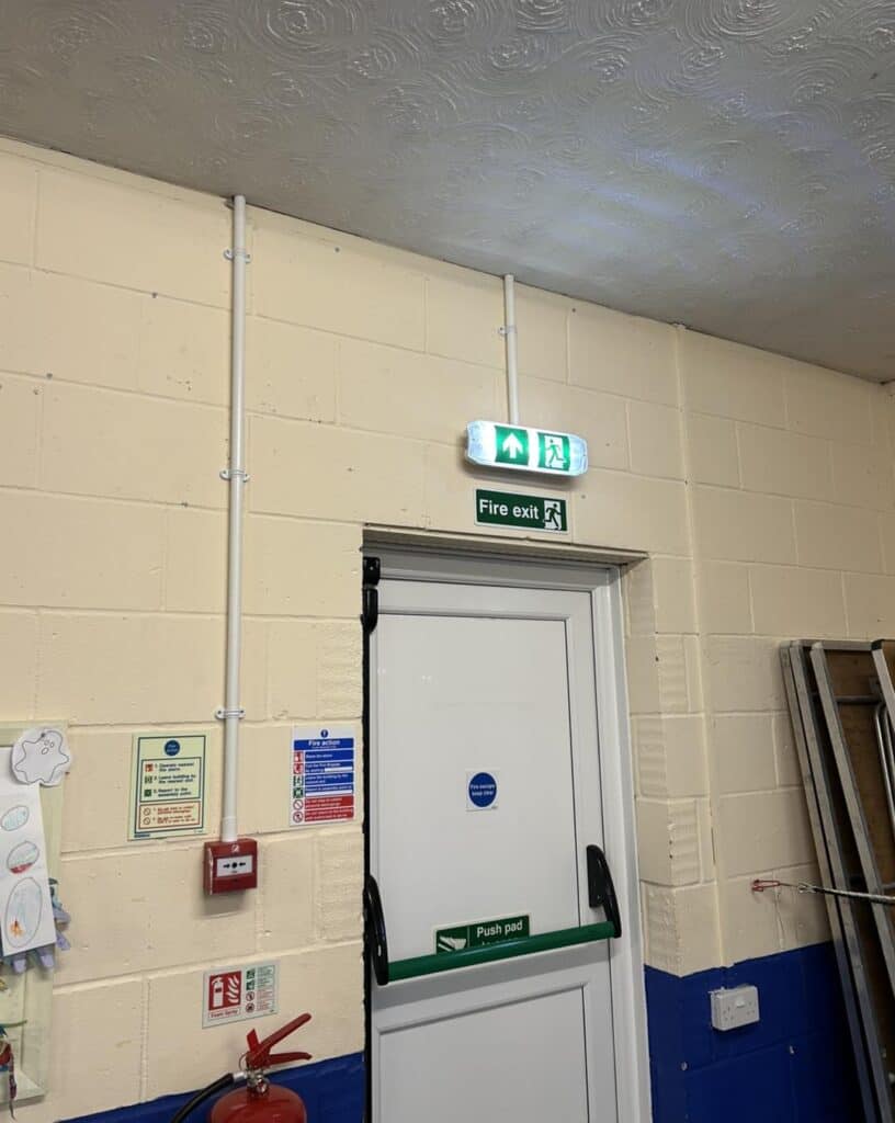 Installation of fire exit emergency lighting inside commercial building