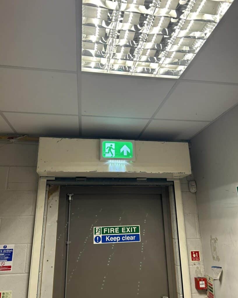 Installation of fire exit emergency lighting inside commercial building