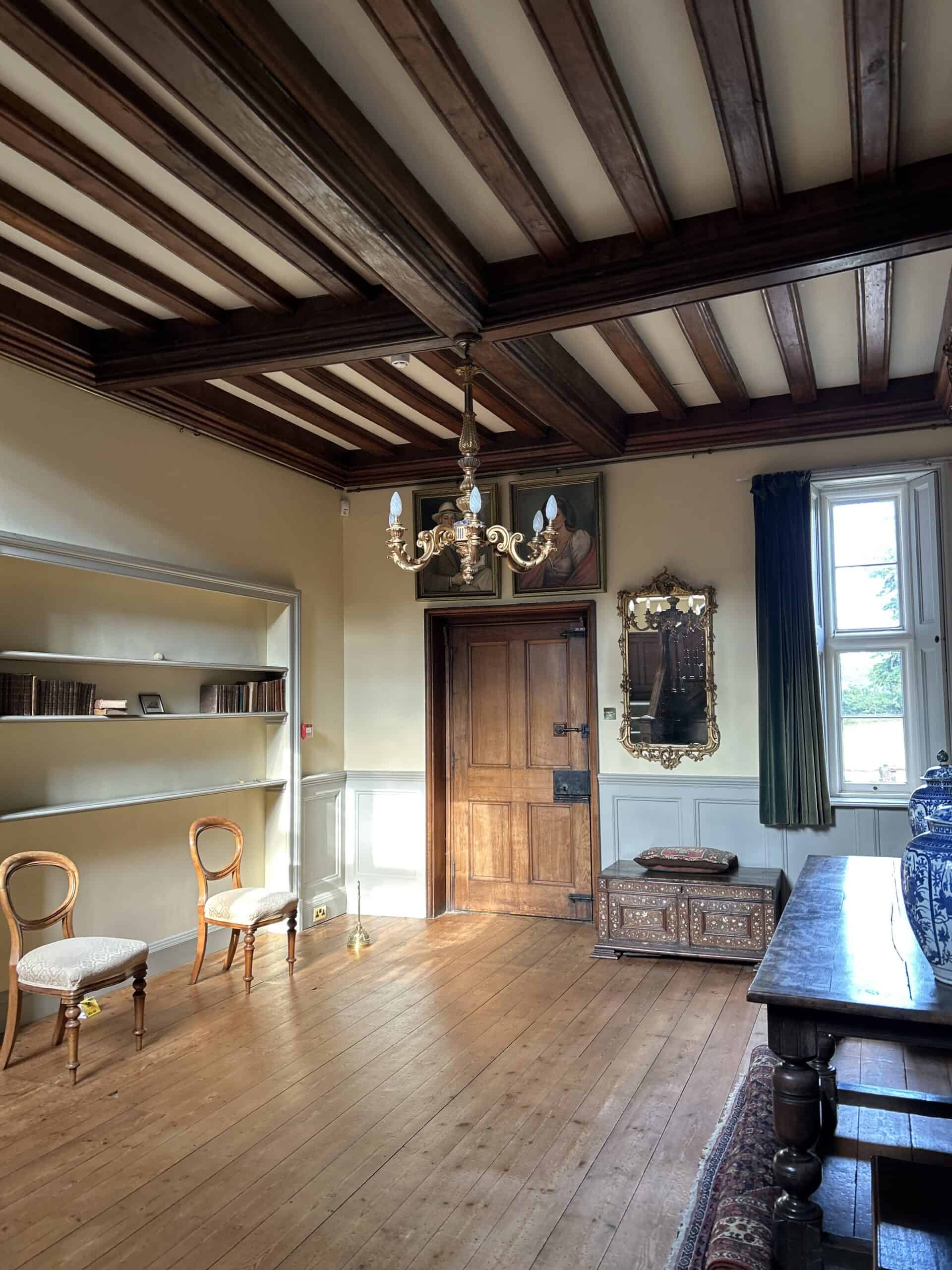 Stylish interior room with wooden ceiling and decor.