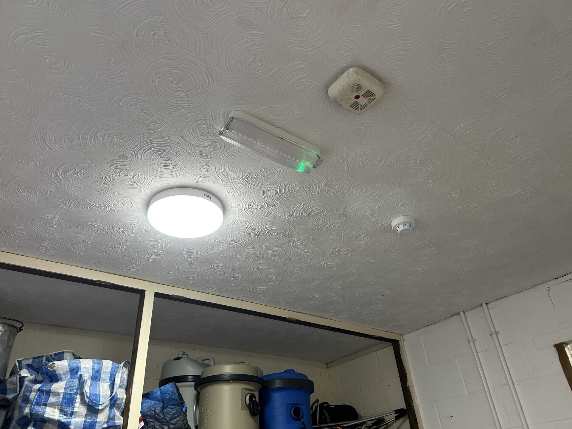 Ceiling with lights and smoke detector fixtures