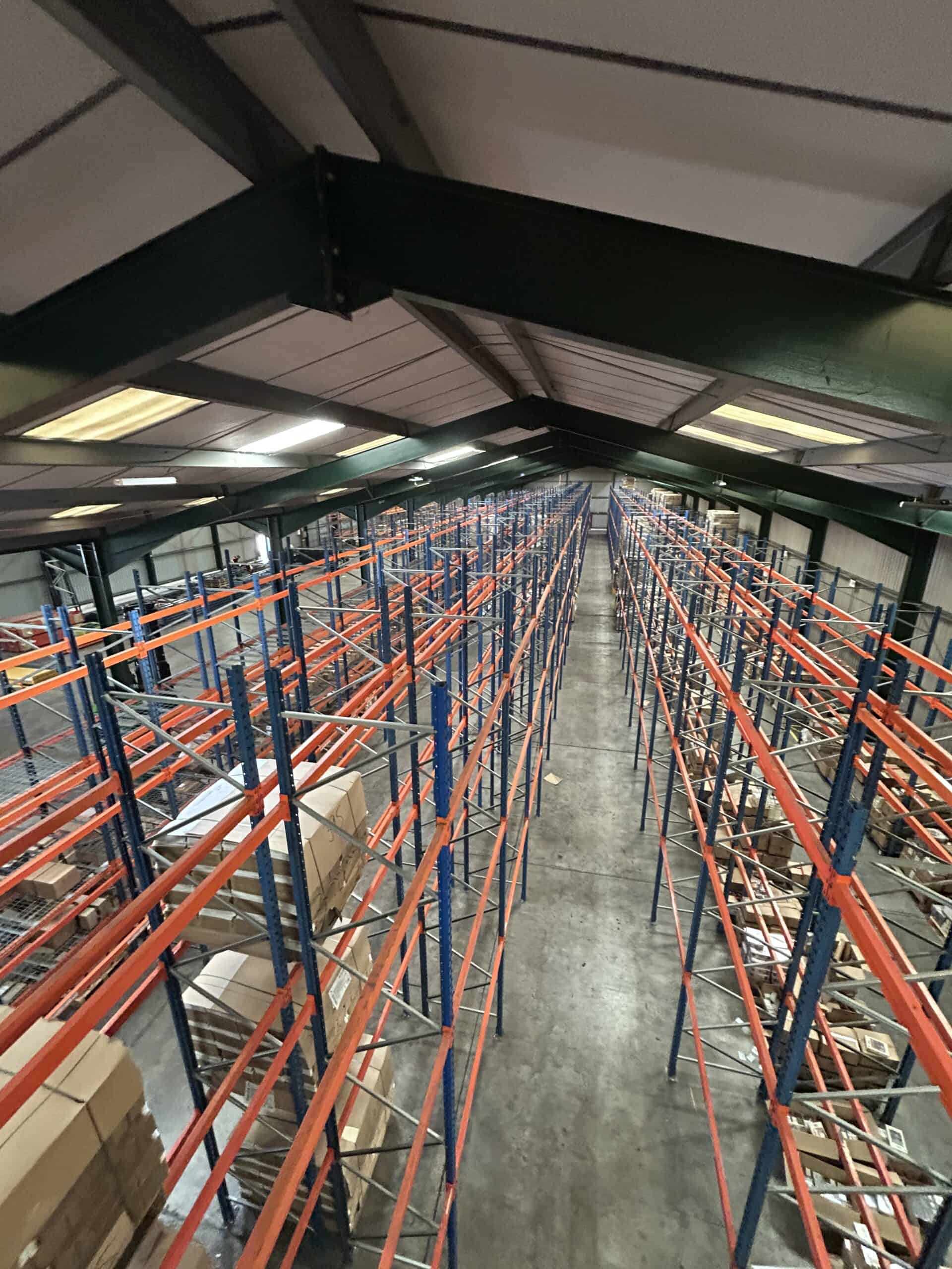 Warehouse interior with high shelves and boxes