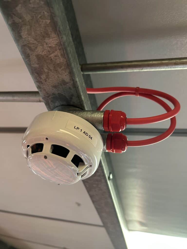 Addressable detector mounted in warehouse