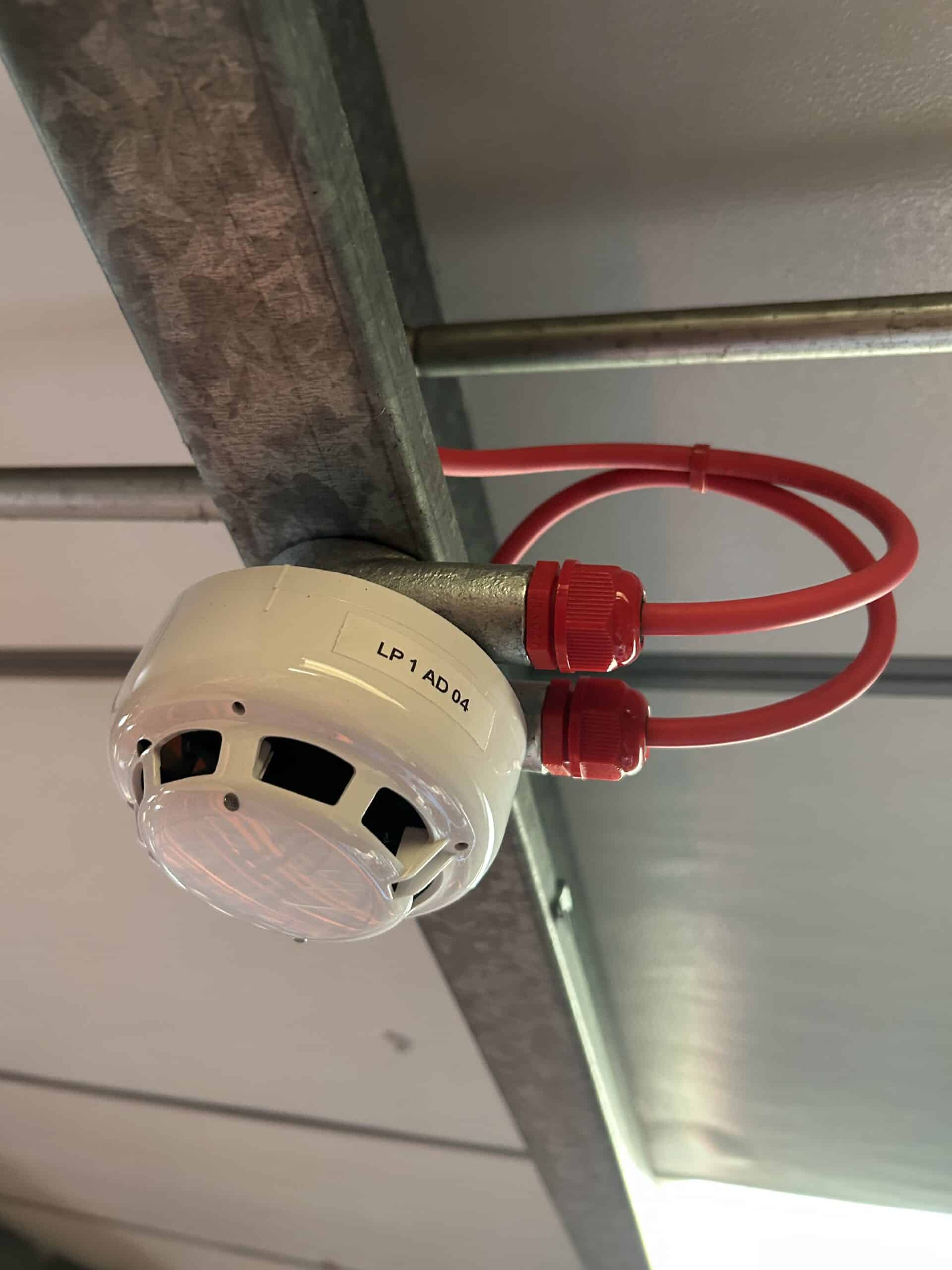 Addressable detector mounted in warehouse
